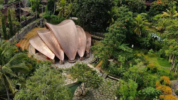 Green architecture project reflecting human form with grounding and extending structures at Lumi Shala.
